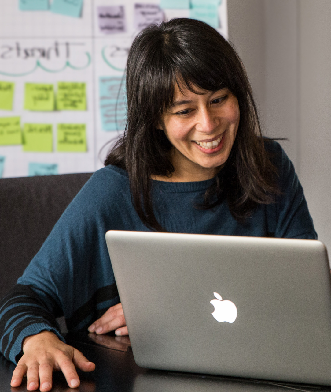 Smile,Computer,Personal computer,Table,Furniture,Laptop,Output device