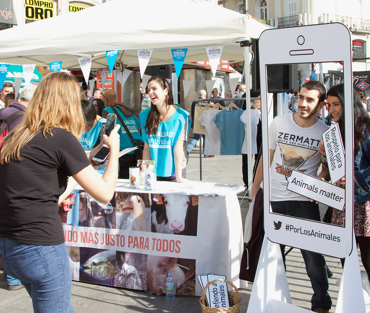 Couple taking a picture during Animal Equality event