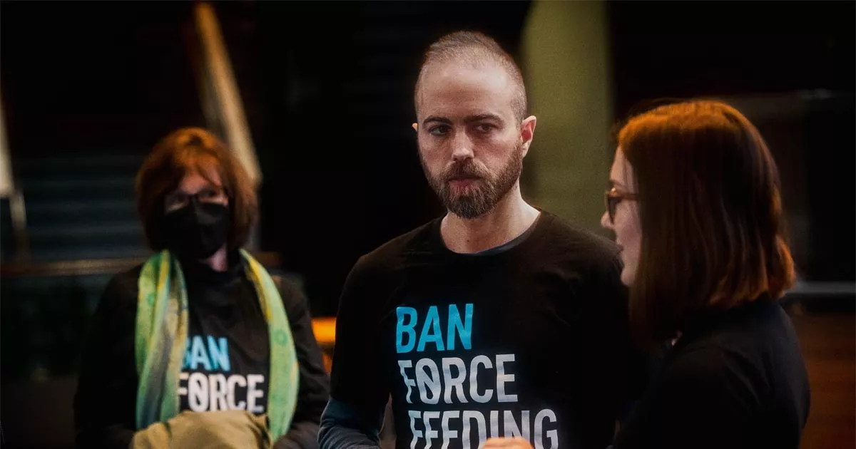 Animal Equality volunteers showing their support for a ban on force feeding.
